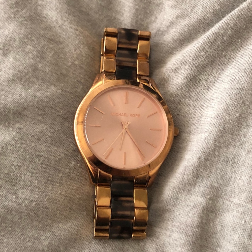 Michael Kors rose gold watch.